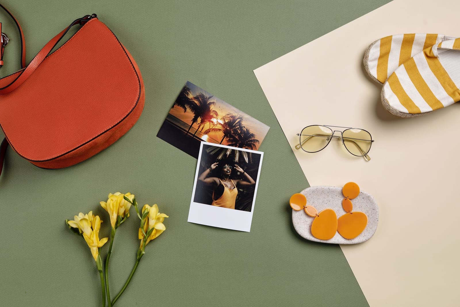 A flat lay of travel accessories laid out before a trip